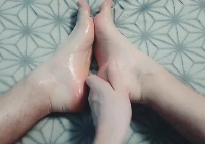 Guy Gently Massages His Feet with Oil