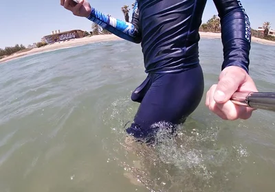 Surfer Gets Erect in His Lycra for the Pleasure of the People