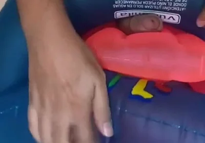Playing with inflatable swim ring