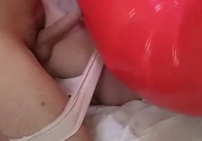 Playing with Red Swimring Pool Toy