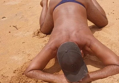 Ladysmith Doing a Striptease on the Beach Showing off Her Tanned Ass with Sexy Mark