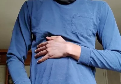 Masturbating