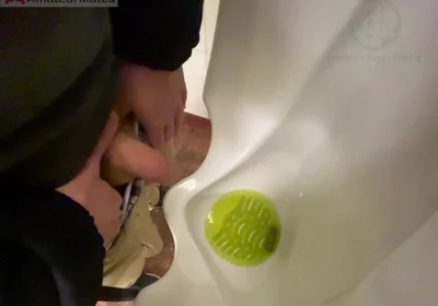 Amateur Redhead Guy Caught Pissing in a Public Toilet's Urinal - He Then Quickly Plays with His Cock Before Leaving