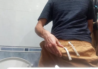 The Guy with the Huge Cock so Fat in His Pants, He Unloads It with 5 Jets of Semen in the Air
