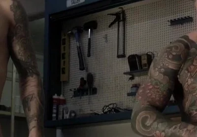 Two Friends in the Mechanic's Workshop