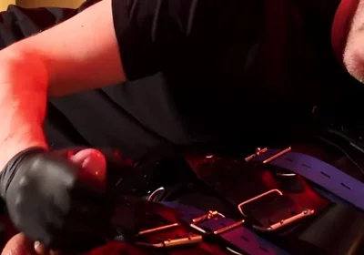Edging the Boy in Leather Bondage but He Is Not Allowed to Orgasm