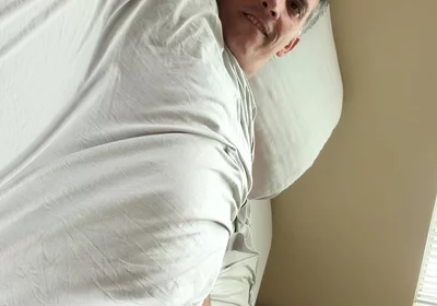 Duke Silver Plays the Trombone in Bed