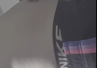 Young Man Holds a Full Bladder