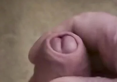 My Friend Sits in a Chair and Jerks off His Cock While Watching Video