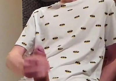 Sweet load of cum flows from this cute guy's big cock
