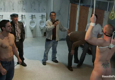 The Wrestler Gets Gang Banged by a Horny Crowd in a Public Restroom for Losing His Match.