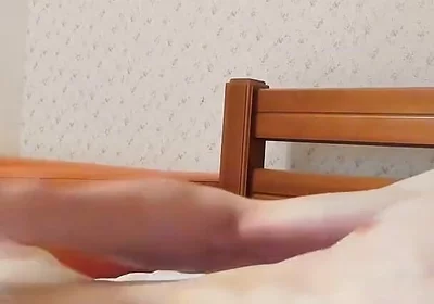 I masturbate lying on the couch in sneakers